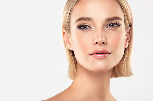 Beautiful Young Woman with Clean Fresh Skin