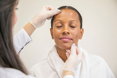 woman getting facial trearment